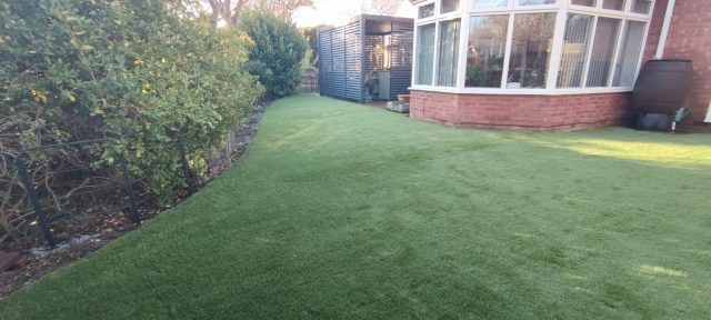 artificial grass installation in back garden in Colchester, Essex