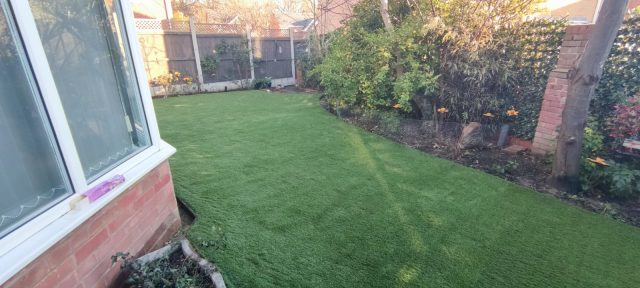 artificial grass installation in back garden in Colchester, Essex